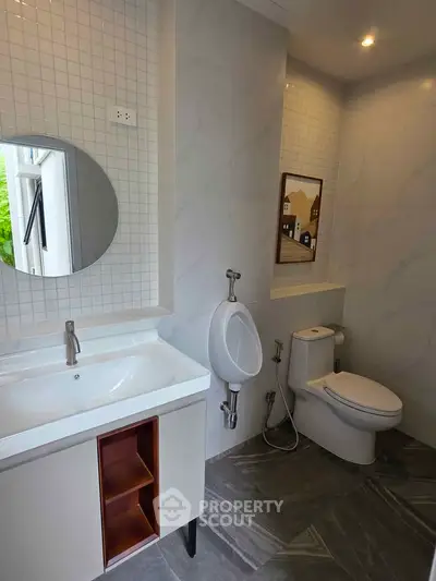 Modern bathroom with sleek fixtures and stylish tile design