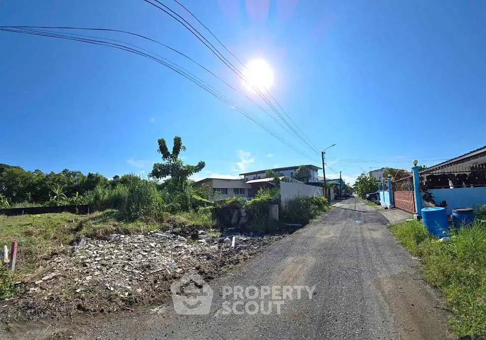 Spacious residential plot on a sunny street, ideal for building your dream home.