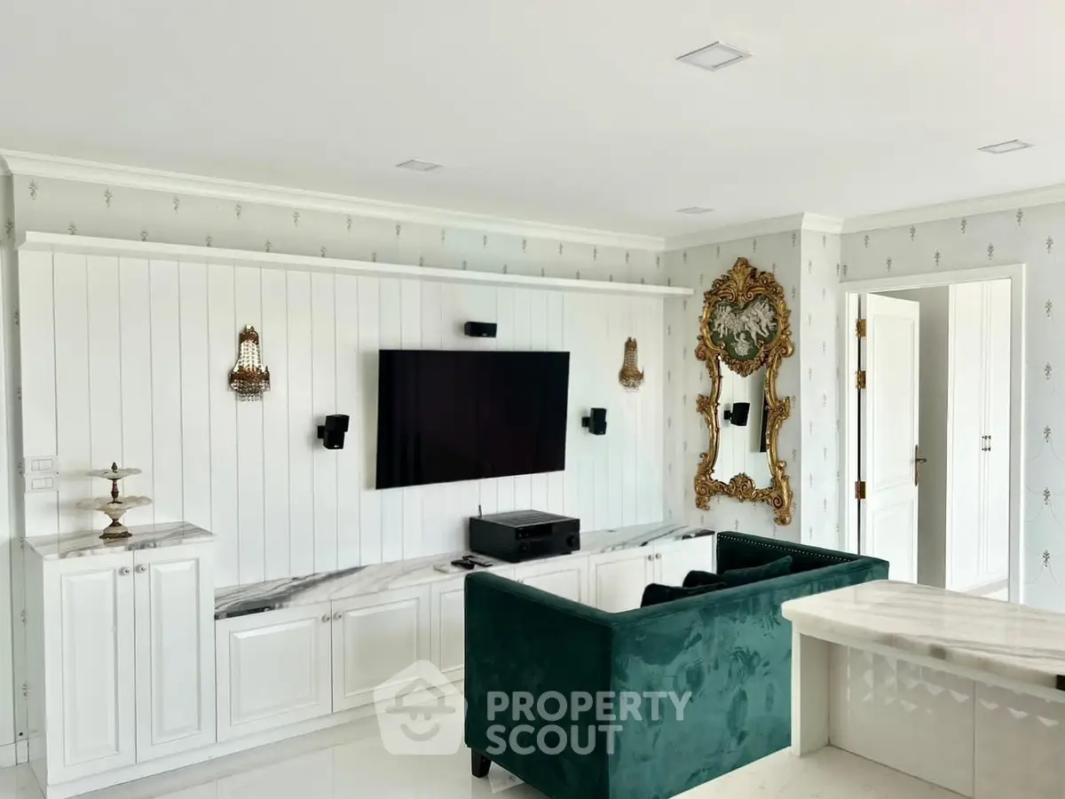 Luxurious living room with elegant decor and modern entertainment setup