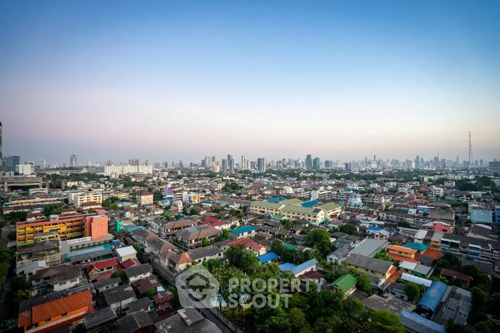 Stunning panoramic cityscape view showcasing vibrant urban skyline and residential areas.