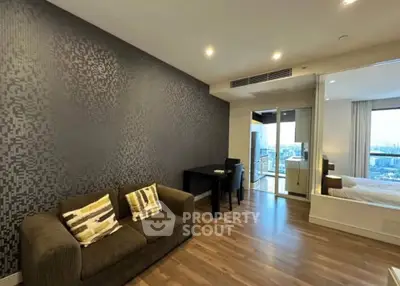 Modern living room with stylish decor and balcony view in a luxury apartment