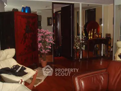 Luxurious living room with elegant decor and hardwood flooring