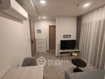 Modern living room with sleek furniture and cozy ambiance