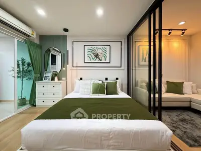 Modern bedroom with green accents and sliding glass doors