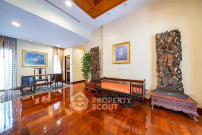 Luxurious living room with polished wooden floors and elegant decor