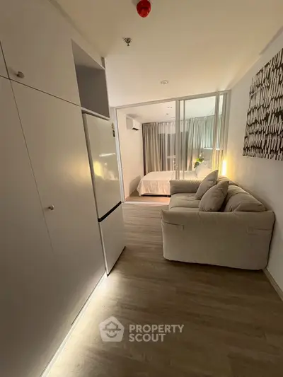 Cozy studio apartment with modern furnishings and open layout