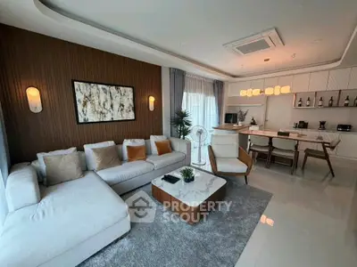 Luxurious modern living room with elegant decor and open kitchen layout