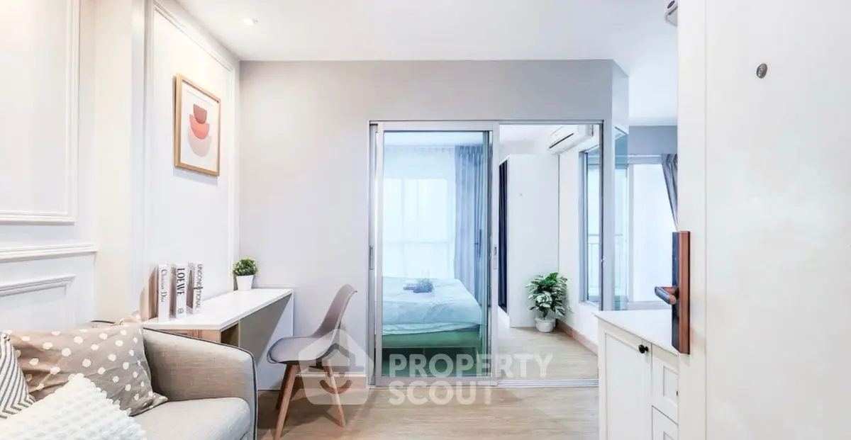 Modern apartment interior with cozy living area and stylish bedroom view.