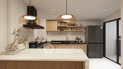 Modern kitchen with sleek appliances and open layout, featuring a stylish island and contemporary lighting.