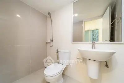 Modern bathroom with sleek fixtures and minimalist design.