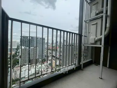 Stunning high-rise balcony view with cityscape and modern architecture.