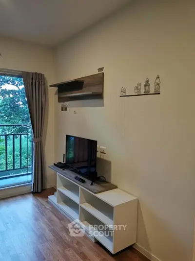 Modern living room with balcony view and stylish decor