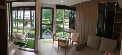 Modern living room with garden view and cozy seating area