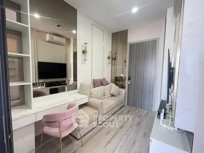 Modern living room with stylish decor and mirrored wall accents