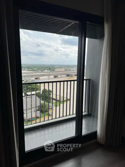 Stunning balcony view with expansive cityscape and lush greenery, perfect for relaxation and enjoying the skyline.