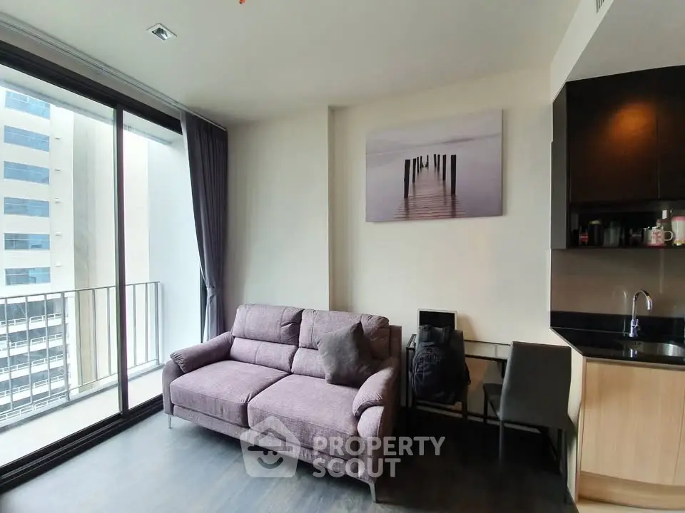 Modern living room with balcony view in urban apartment