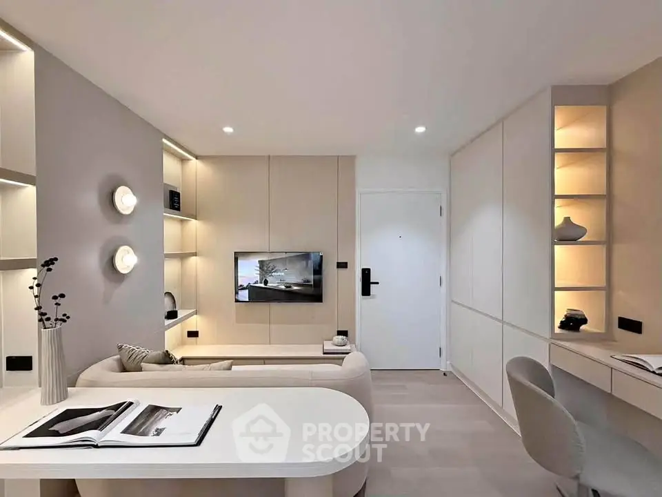 Modern living room with sleek furniture and built-in shelving, perfect for stylish urban living.