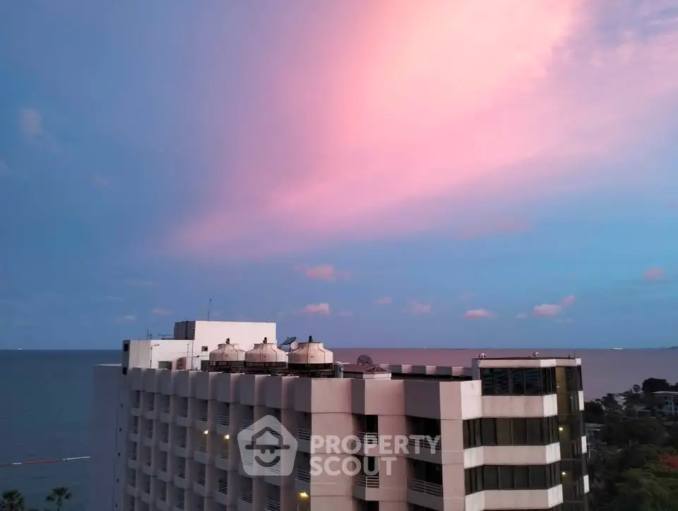 Stunning ocean view from high-rise building at sunset