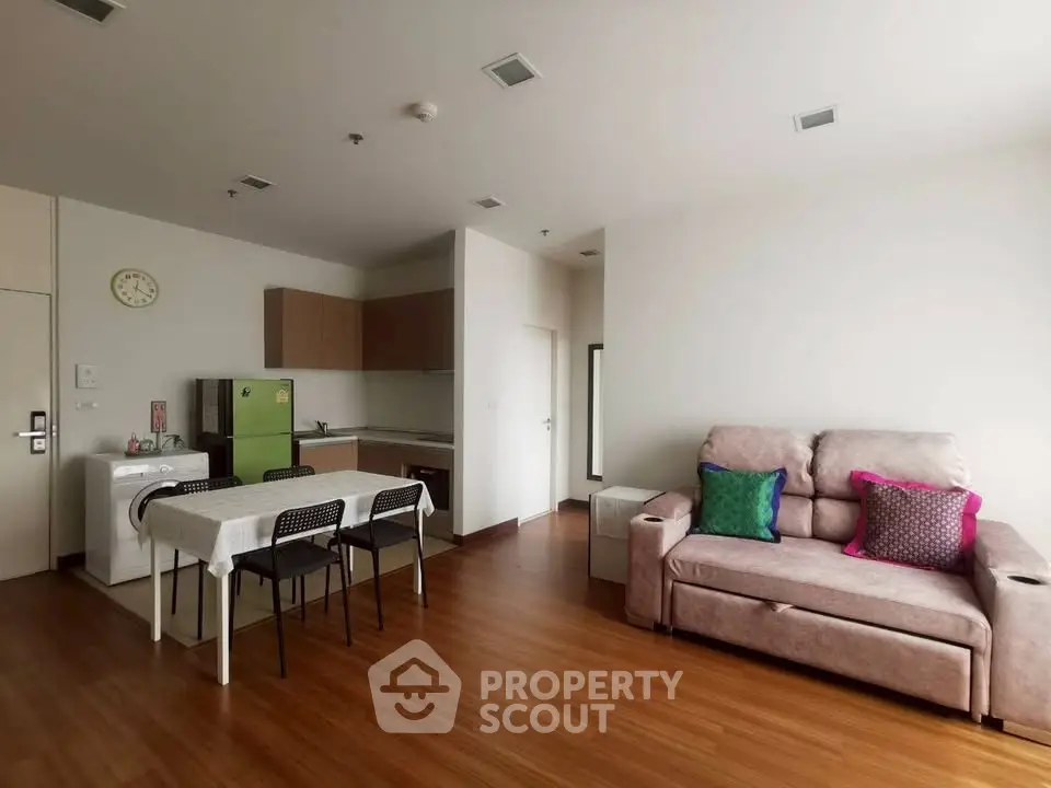 Modern open-layout kitchen and living room with stylish decor