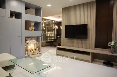 Modern living room with sleek design and built-in TV unit