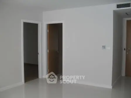 Minimalist interior with white walls and doors in a modern apartment