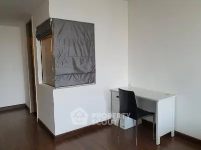 Modern study area with sleek desk and chair in minimalist apartment