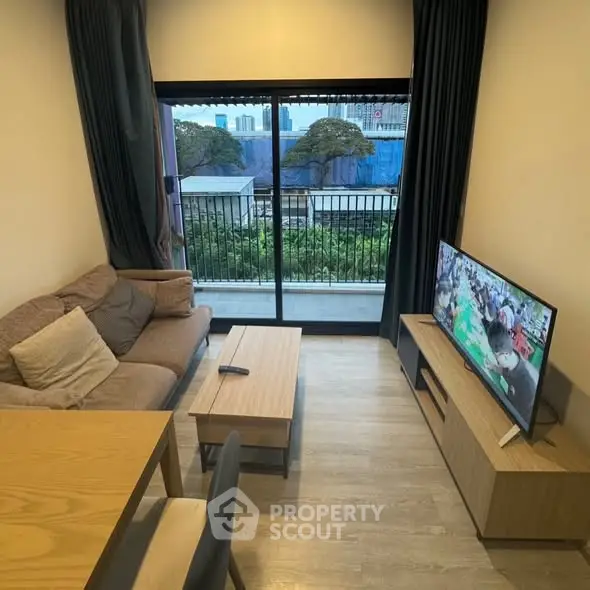 Modern living room with balcony view in urban apartment
