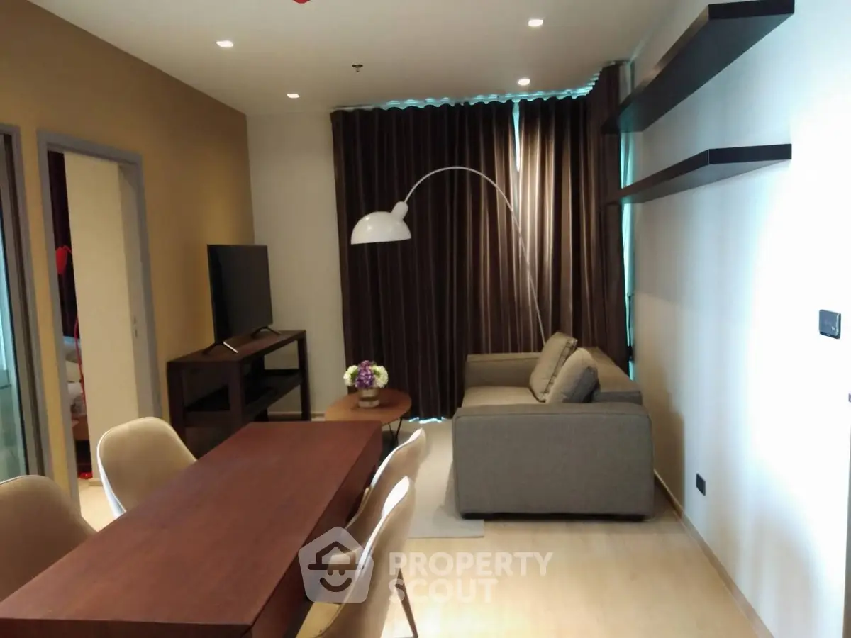 Modern living room with elegant decor and cozy seating area