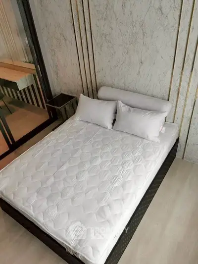 Luxurious modern bedroom with stylish decor and comfortable bedding