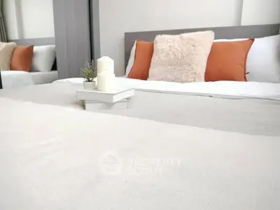 Cozy bedroom with plush pillows and elegant decor