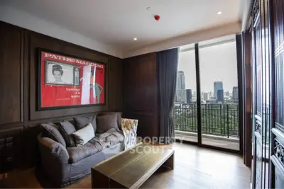 Luxurious living room with city view and balcony access in modern apartment.