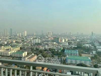 Stunning cityscape view from high-rise balcony showcasing urban skyline and vibrant city life.