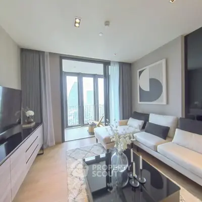 Modern living room with elegant decor and balcony view