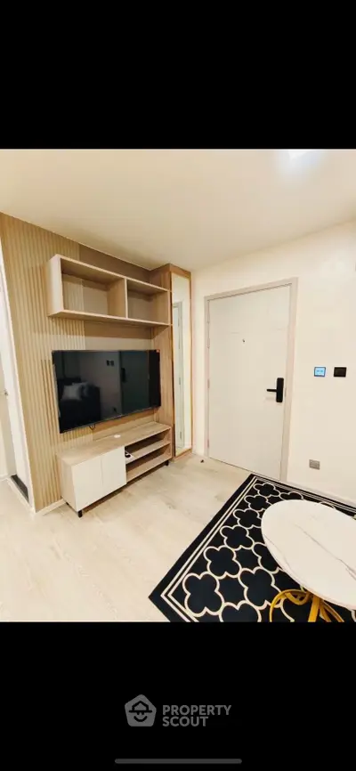 Modern living room with stylish TV unit and elegant decor