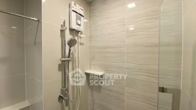 Modern bathroom with sleek shower and elegant tile design