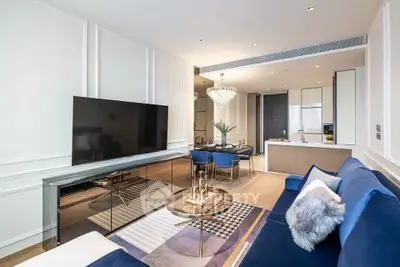Luxurious modern living room with elegant decor and open kitchen layout