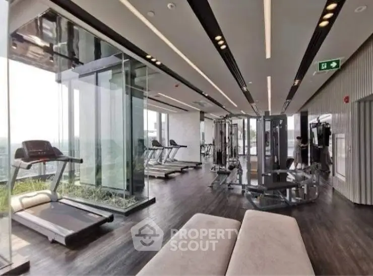 Luxurious high-rise gym with modern equipment and panoramic city views.