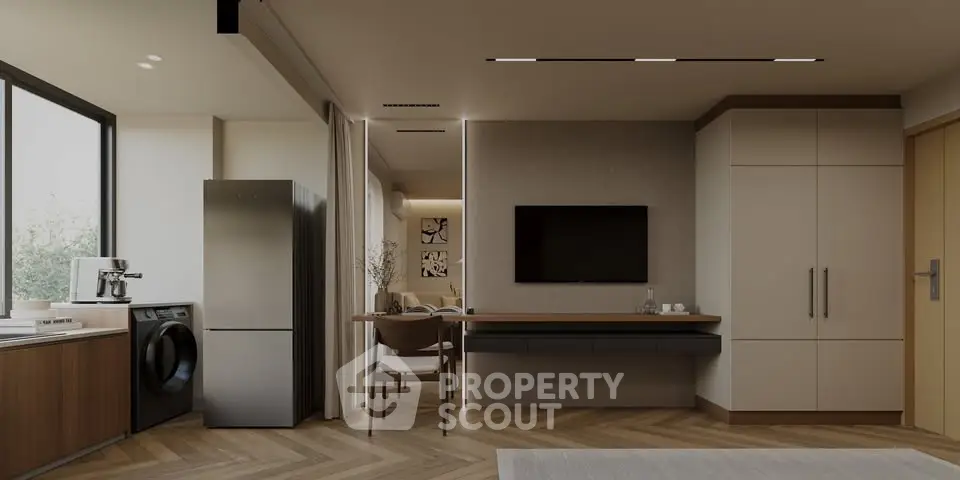 Modern open-plan kitchen and living area with sleek appliances and stylish decor.