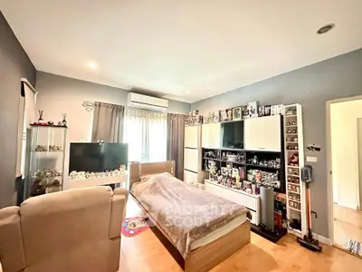 Cozy bedroom with modern decor and ample storage space