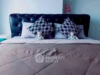 Luxurious bedroom with plush bedding and stylish decor for ultimate comfort.