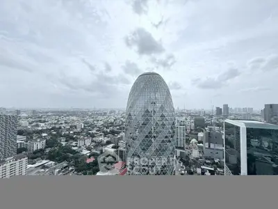 Stunning cityscape view featuring a unique architectural building with a geometric facade.