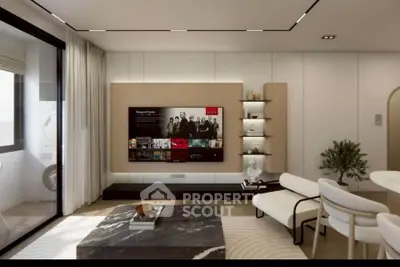 Modern living room with sleek furniture and large TV, featuring elegant decor and natural light.