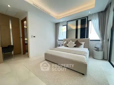 Luxurious modern bedroom with elegant decor and natural light