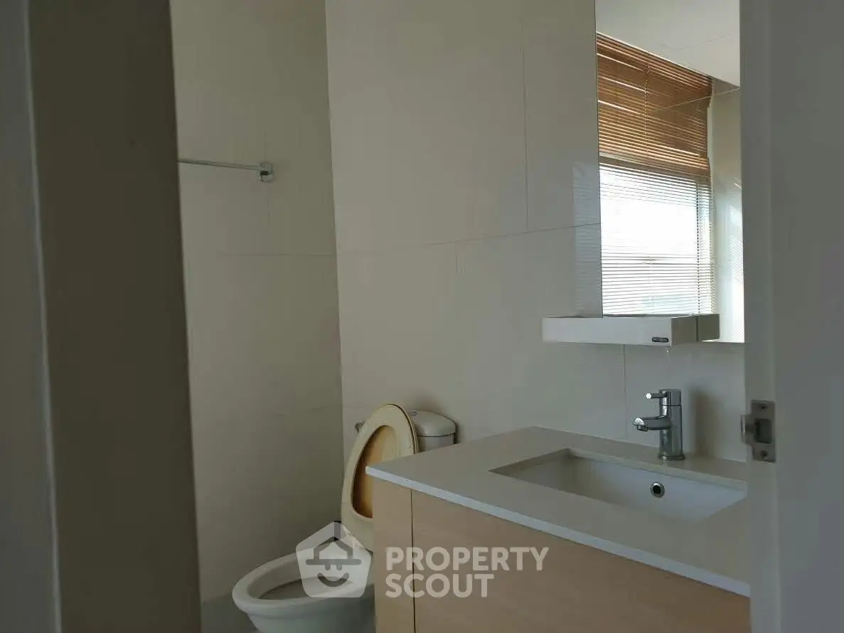 Modern bathroom with sleek fixtures and natural light