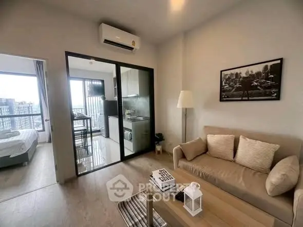 Modern apartment living room with open kitchen and cozy decor