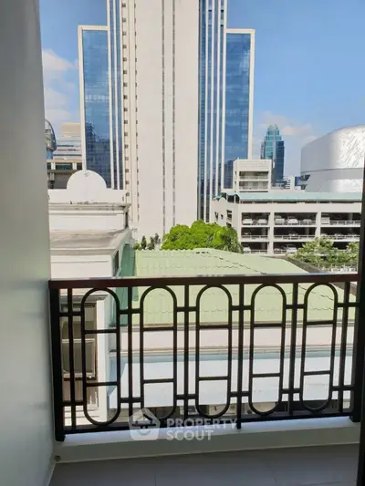 Urban balcony with cityscape view and modern architecture