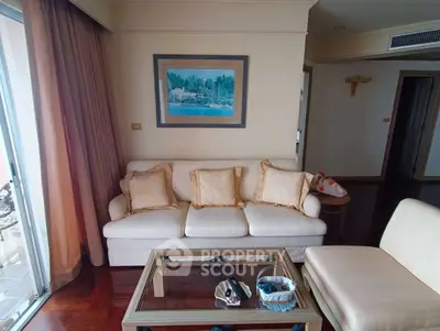 Elegant living room with plush sofa and stylish decor in luxury apartment