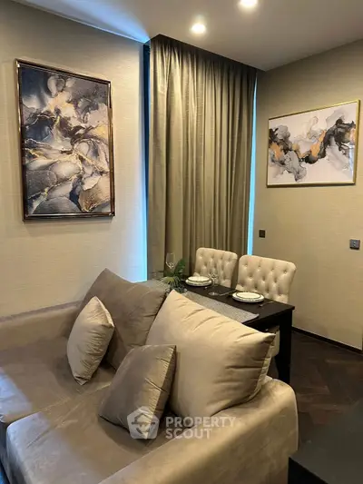 Elegant living room with modern decor and cozy dining area.