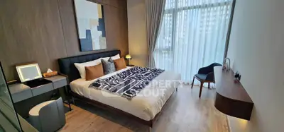 Luxurious modern bedroom with stylish decor and large window view