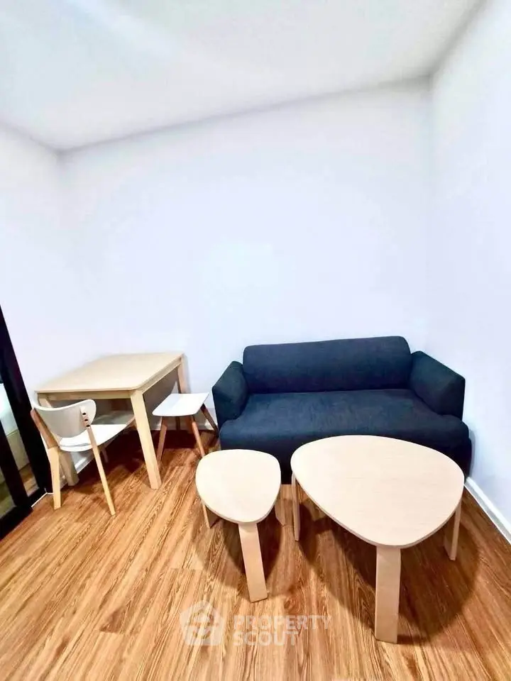 Cozy living room with modern furniture and wooden flooring